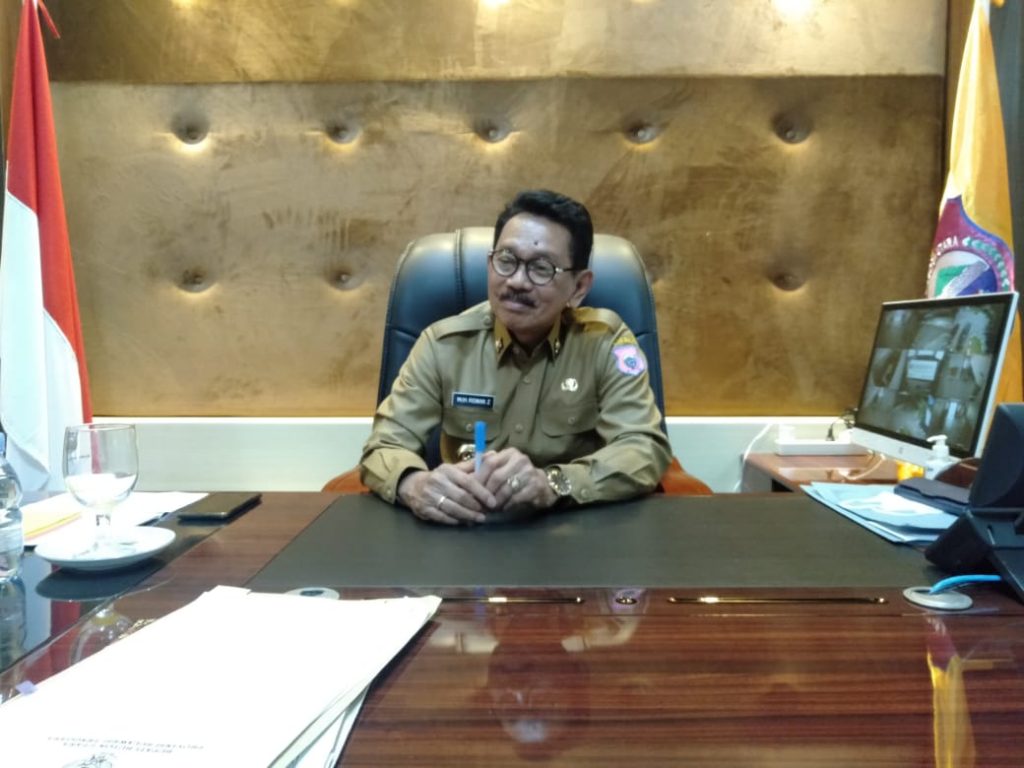 Kades Morindino Diduga Palsukan Dokumen LPJ Pembangunan Balai Desa,Ridwan Zakariah Perintahkan Inspektur Audit Kades Morindino 2 F01.1 Bupati Butur Ridwan Zakariah